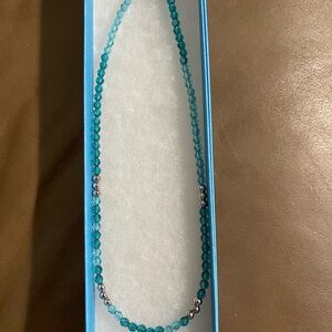 Two Tpuchstone Crystal by Swarovski. Both in beautiful blues.